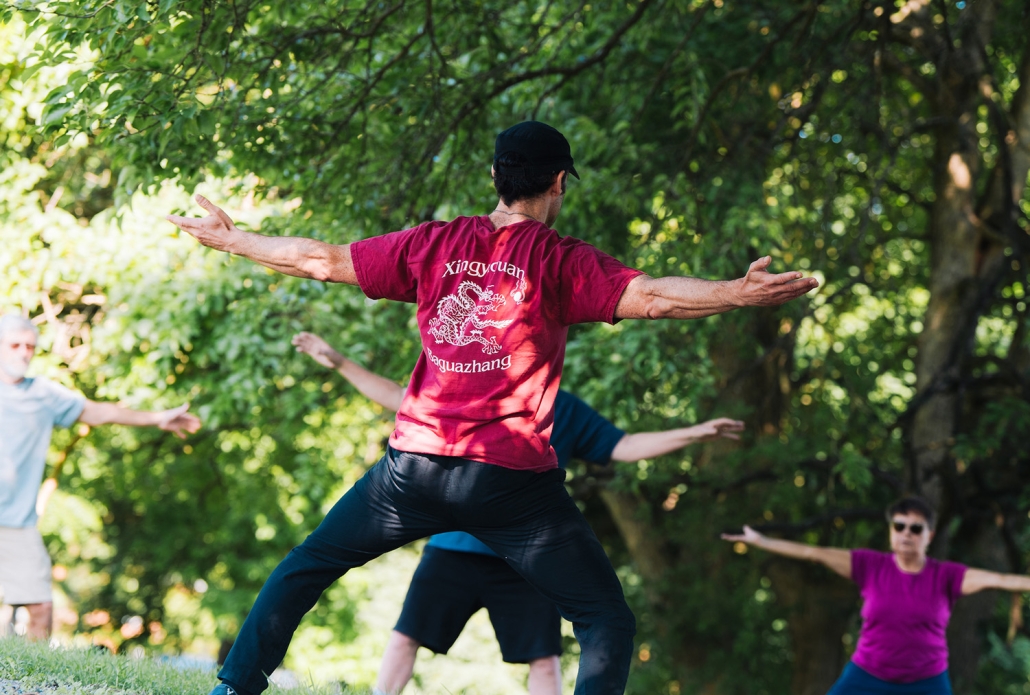 Shen Dao Clinic patients practicing martial arts outside